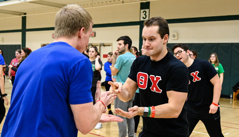 Rock paper siccors game being played