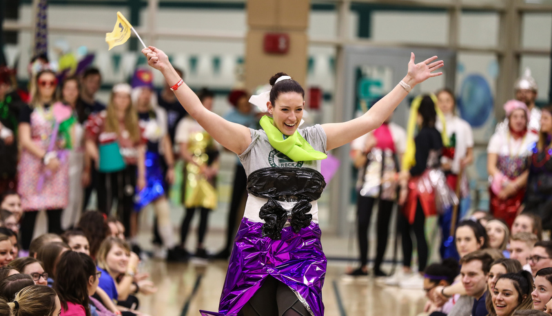 students participat in a trash fashion show