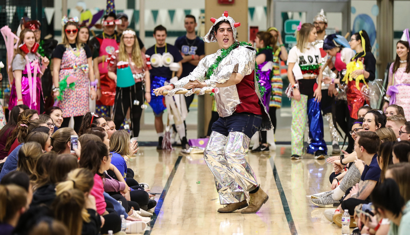 students participat in a trash fashion show