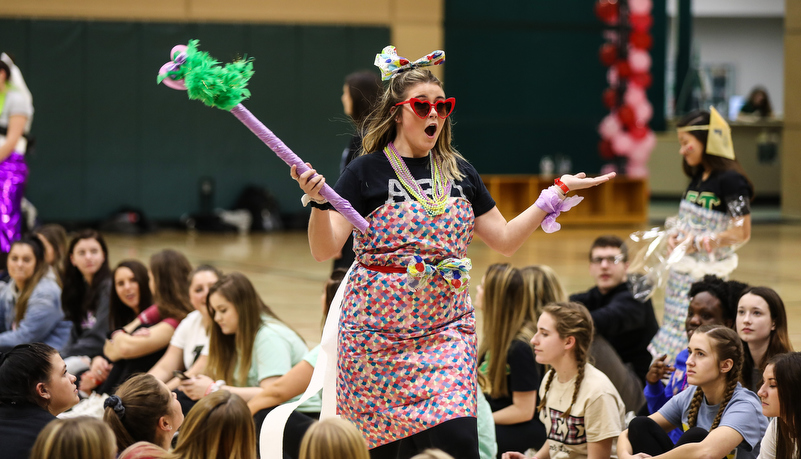 students participat in a trash fashion show