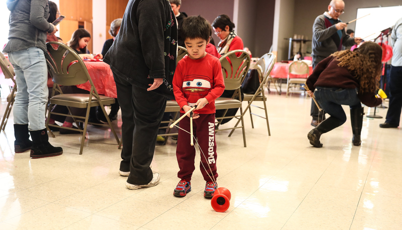 Child playing a Chinese game