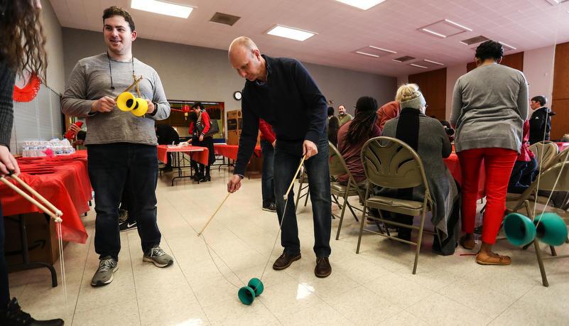 Professor trying a traditional Chinese game