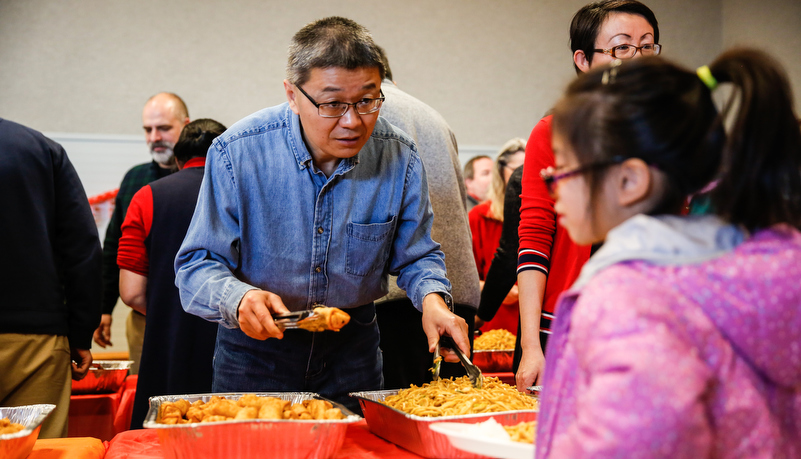 Professor serving food