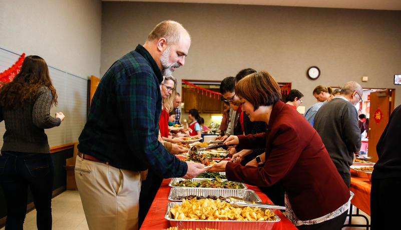 Professor serving food