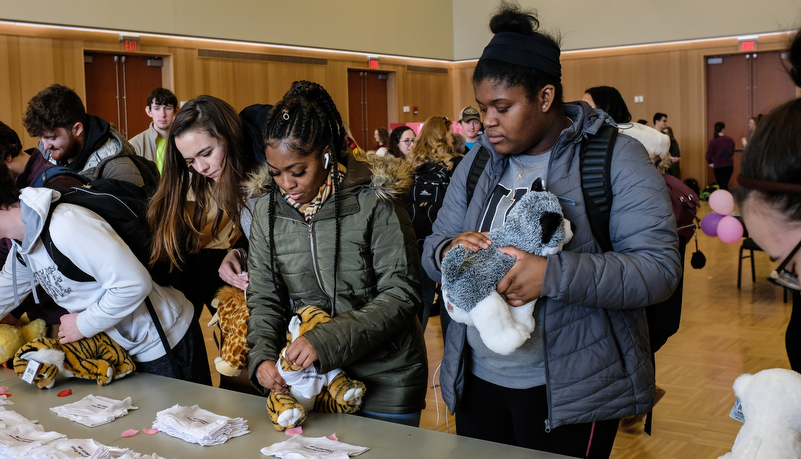 Students making plush toys