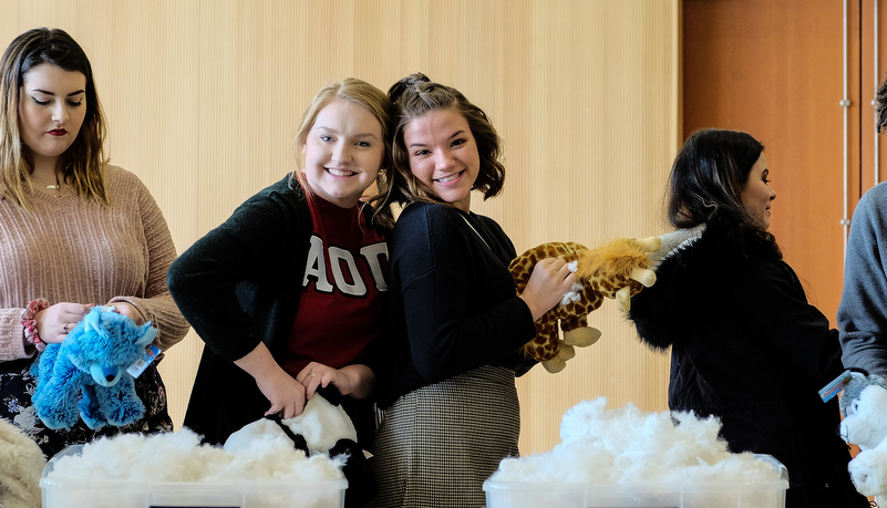 Students making plush