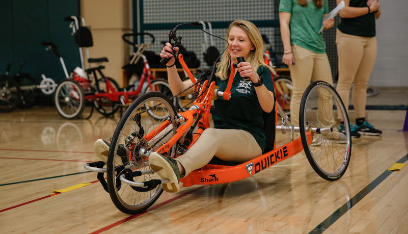 Woman using an accessable bicycle