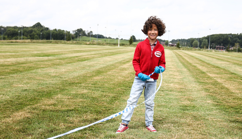 Child playing with a kite