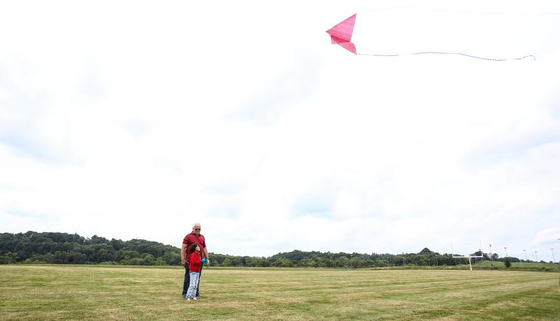 Child playing with a kite