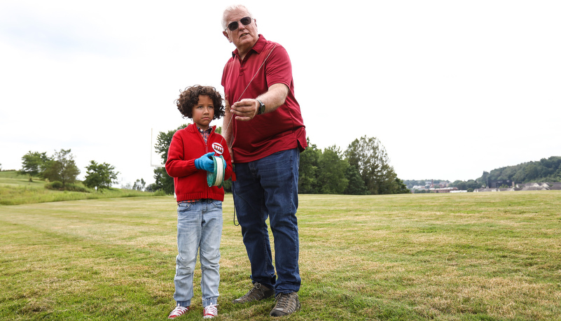 Child playing with a kite