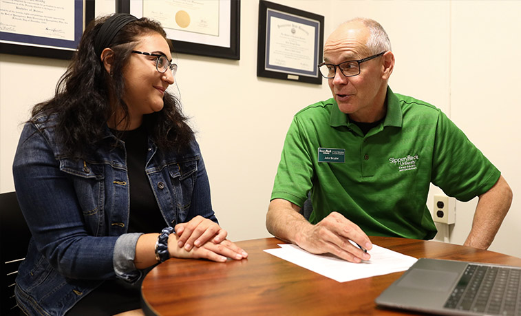 John Snyder working with Marissa Ferrera