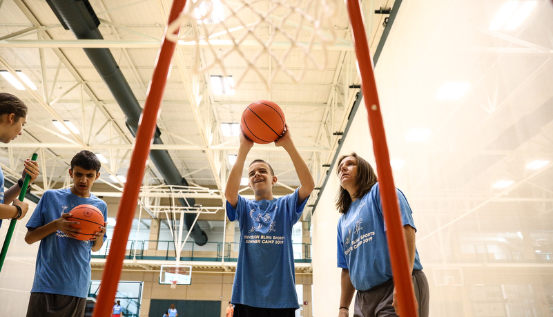 Campers playing basketball