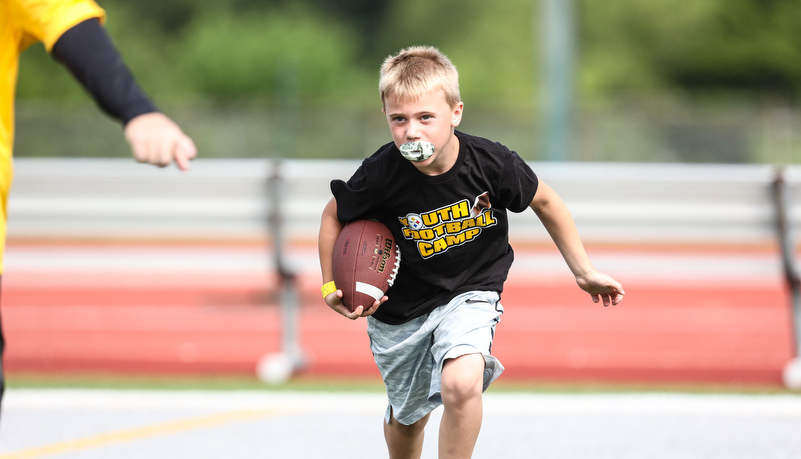 Kids playing football