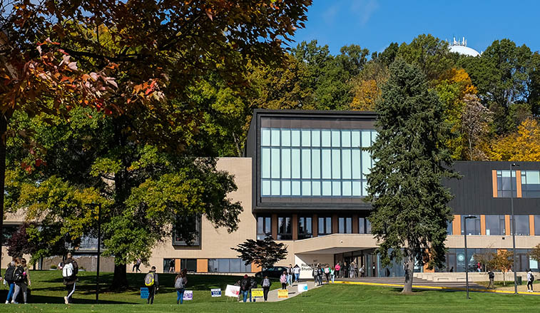 Smith Center with students walking by