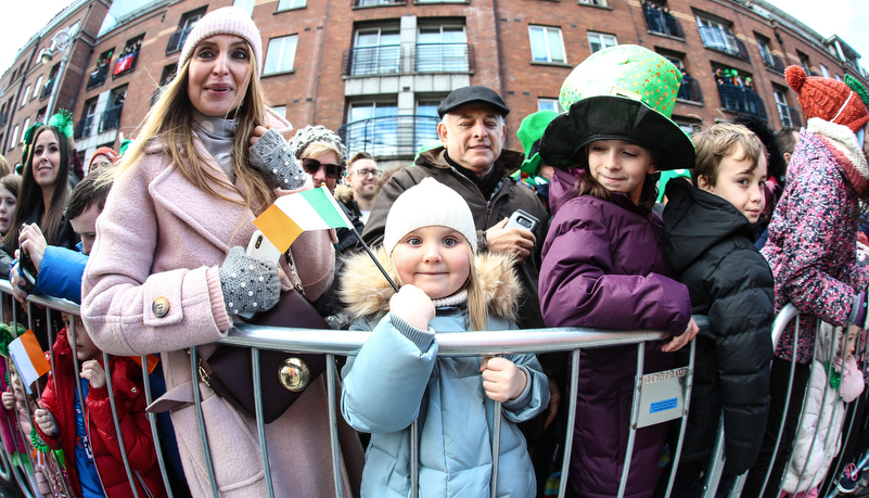 Girl waving the Irish flag