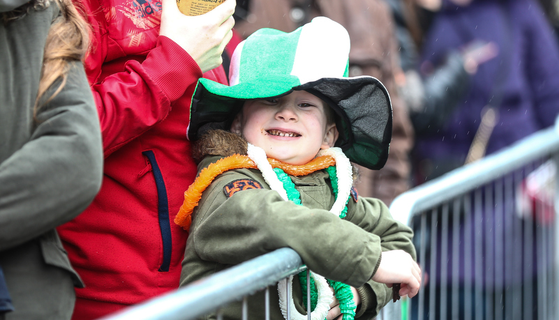 young boy watching the parade