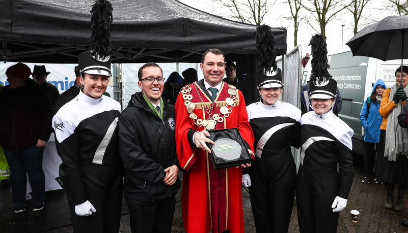 band marching through Limerick