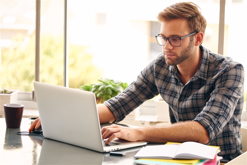 Student Looking at Laptop