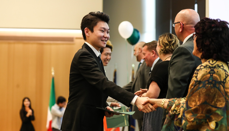 student receives his certificate