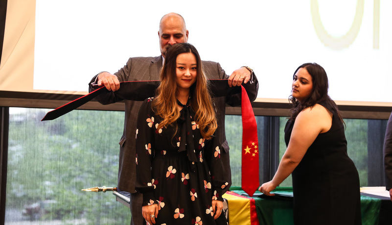 student receives her stoles