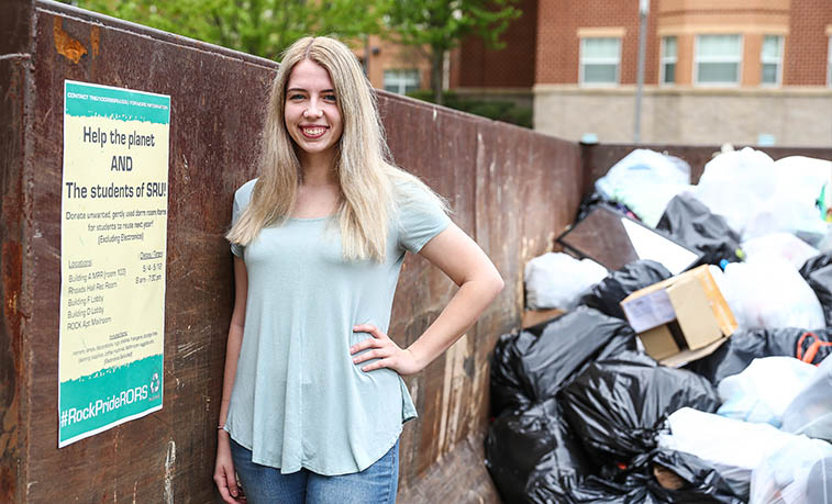 Student advertizing the collection efforts