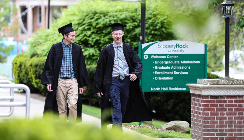 Graduates pose for a photo