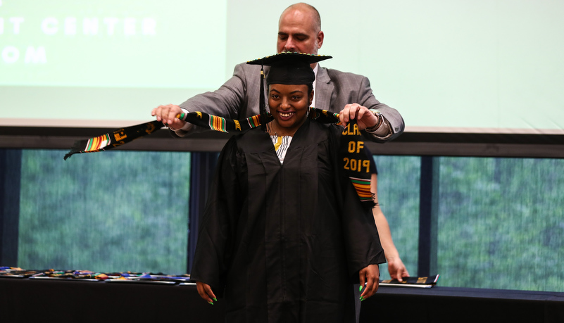 a woman receives her stoles