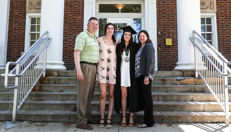 student with her family