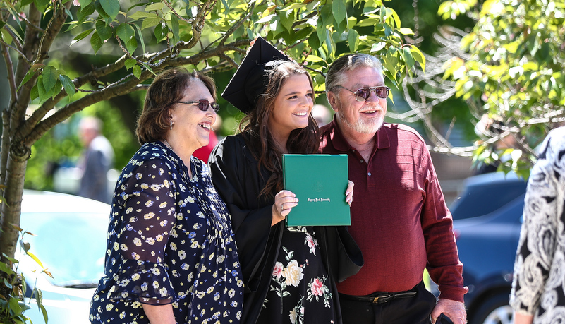 student with her family