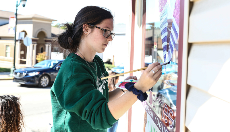 Student's painting indows on main street