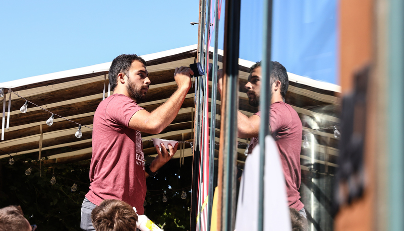 Student's painting indows on main street