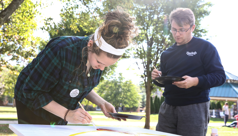 Students painting spirit boards