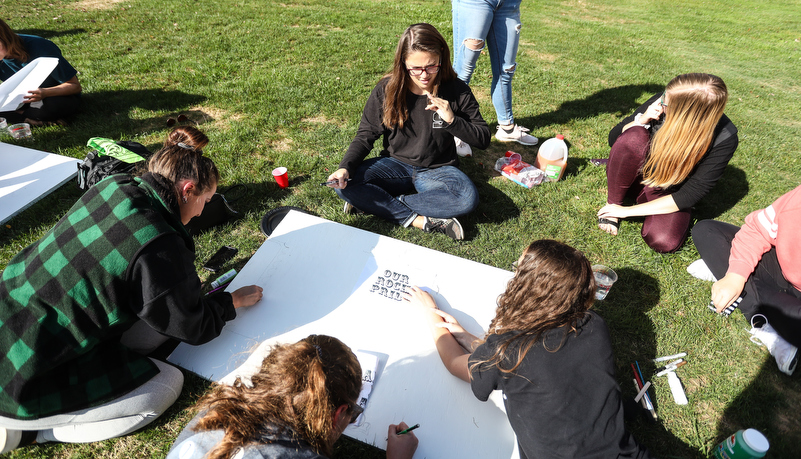 Students painting spirit boards