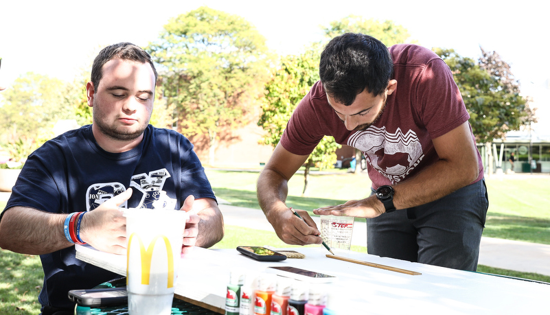 Students painting spirit boards