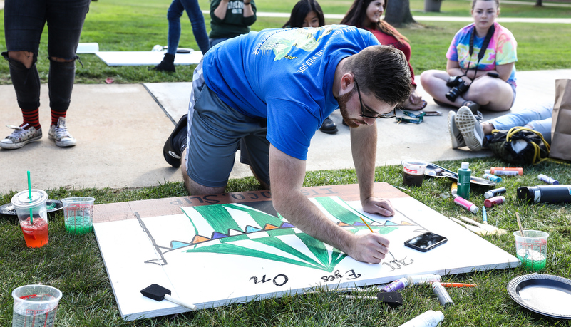 Students painting spirit boards