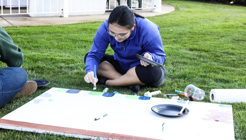 Students painting spirit boards