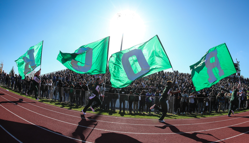 Cheerleaders celebrating a touchdown