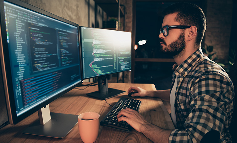 Man working on computer security