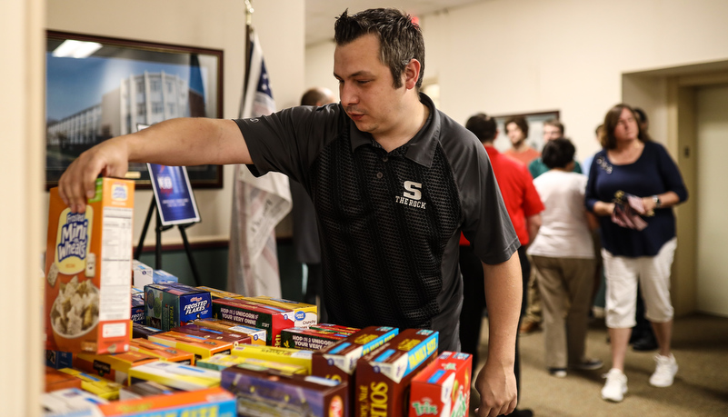 staff donating cereal