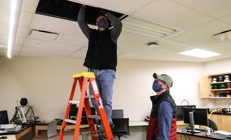 Facilities workers wearing their masks