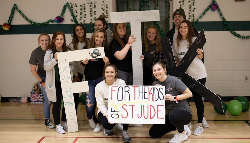 Students with St.Jude sign