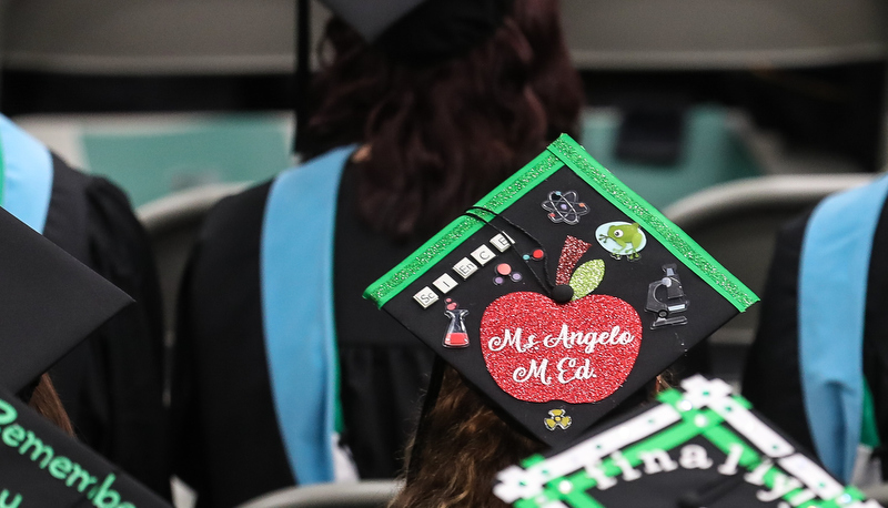 Graduate wearing a decorated cap