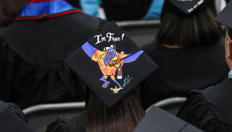 cap with a genie painted on it