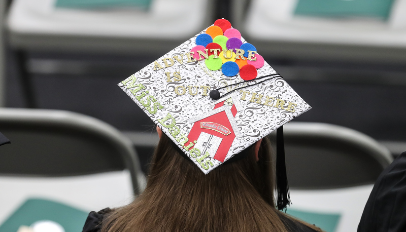 Graduate wearing a decorated cap
