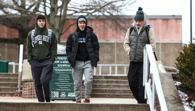 Students walking across campus