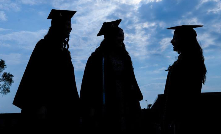 Students wearing graduation caps