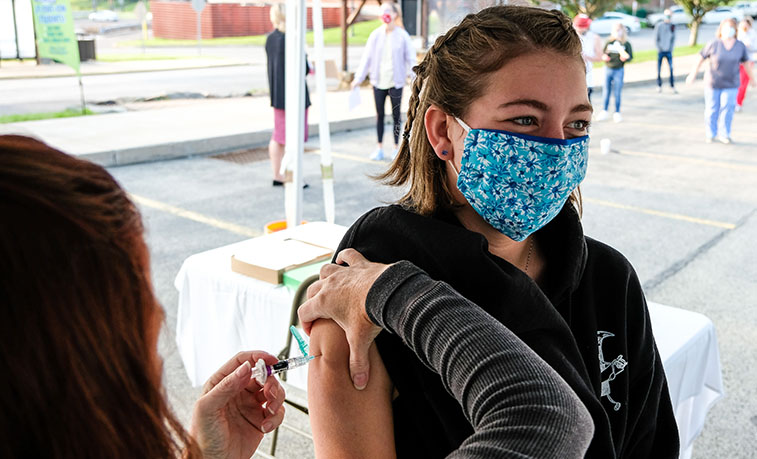 Student receving a flu shot