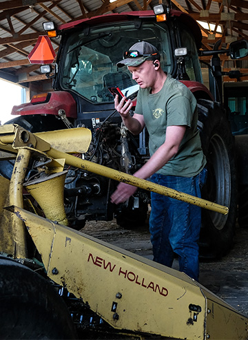 Farmer explaining a process