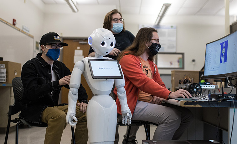 Students working on a robot