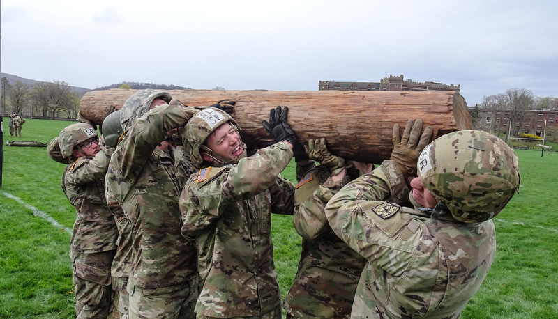 Cadets lifting a log as part of a team drill